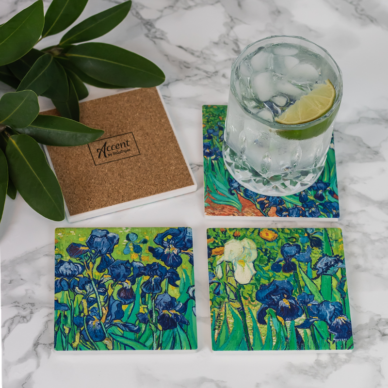 Ceramic Coaster Set with van Gogh Irises and a glass filled with club soda, a lime wedge, and ice cubes