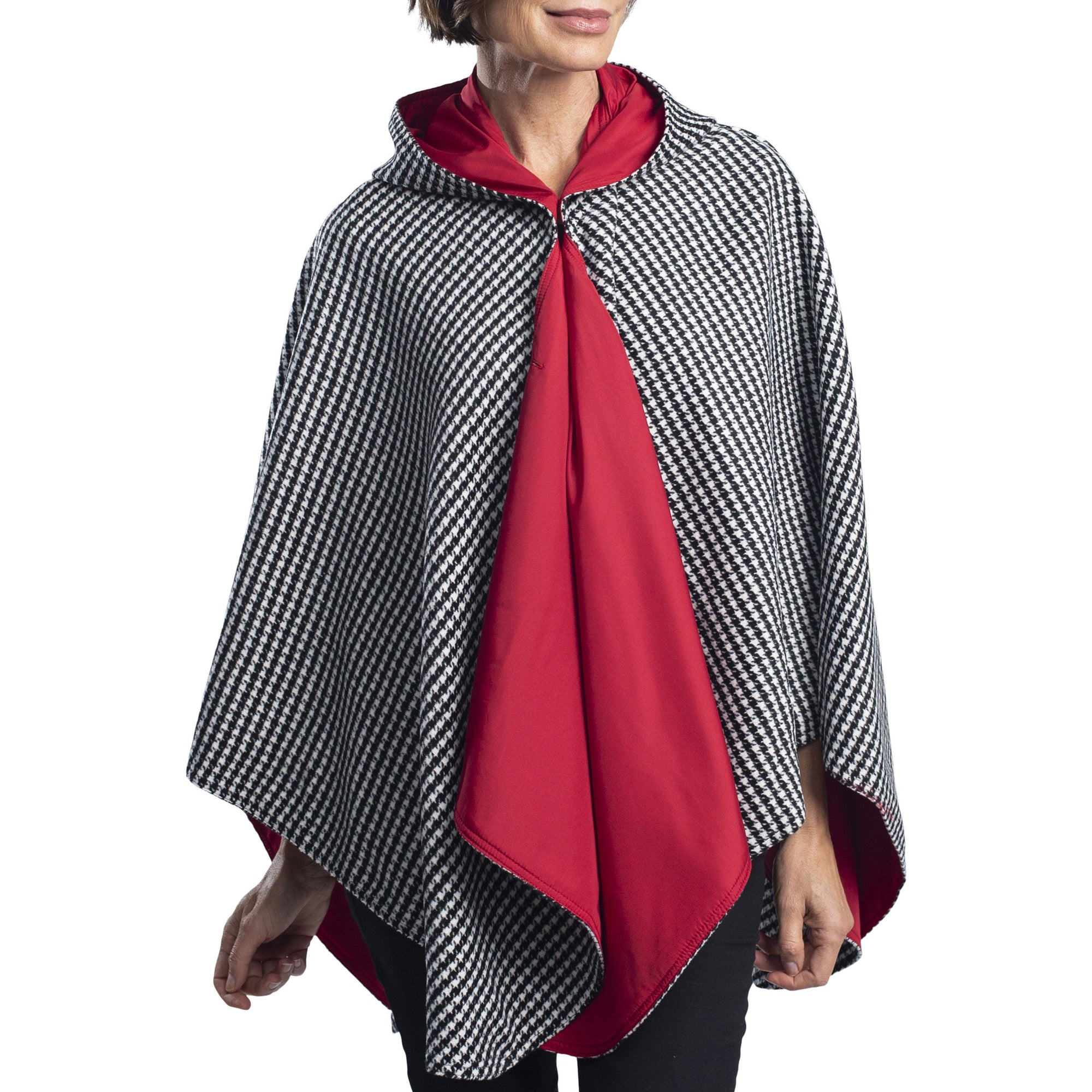 Woman wearing a WarmCaper Warm Houndstooth/Crimson Rainproof and travel cape by RainCaper
