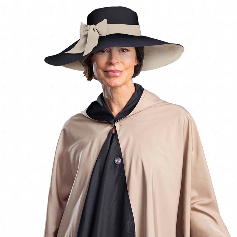 Woman wearing Black and Natural Rain and Sun Floppy Hat 