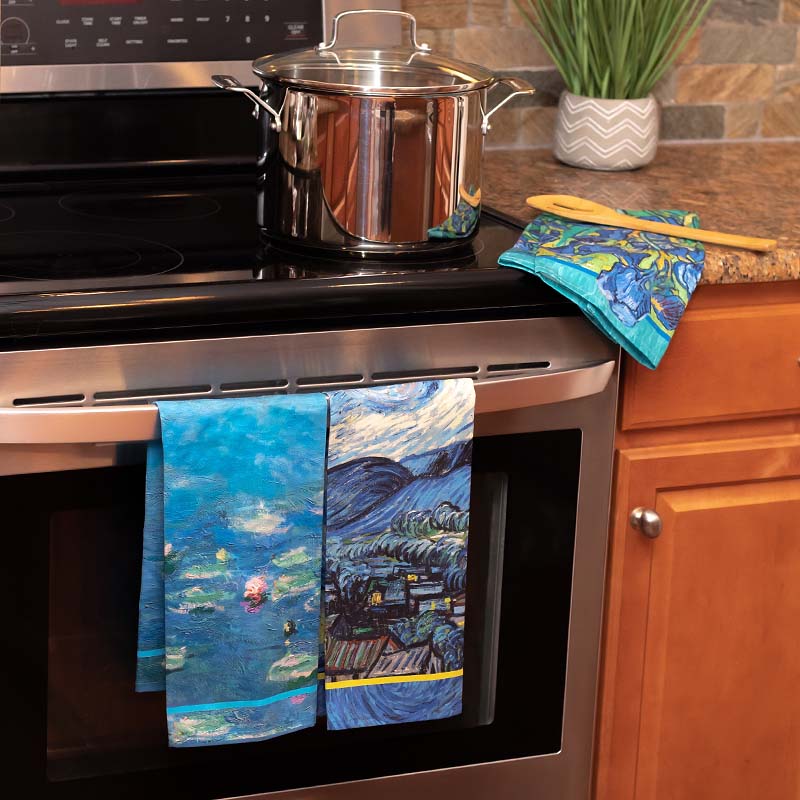 Oven in Kitchen with Monet Water Lilies Tea Towel, van Gogh Starry Night Tea Towel, and van Gogh Irises Tea towel